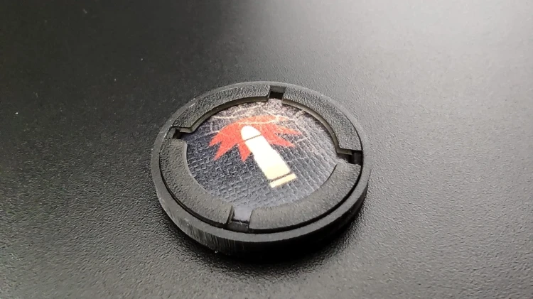 Protektory kapsle oslonki zetony czarne przyklad.jpg