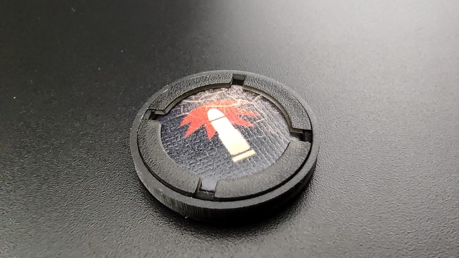 Protektory kapsle oslonki zetony czarne przyklad.jpg